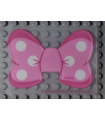 Plastic Bow with White Polka Dots on Bright Pink and Dark Pink Background